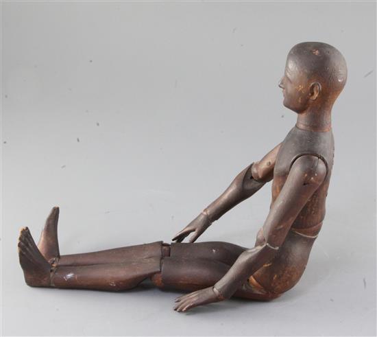 A late 19th / early 20th century carved wood artists lay figure, 19.25in.